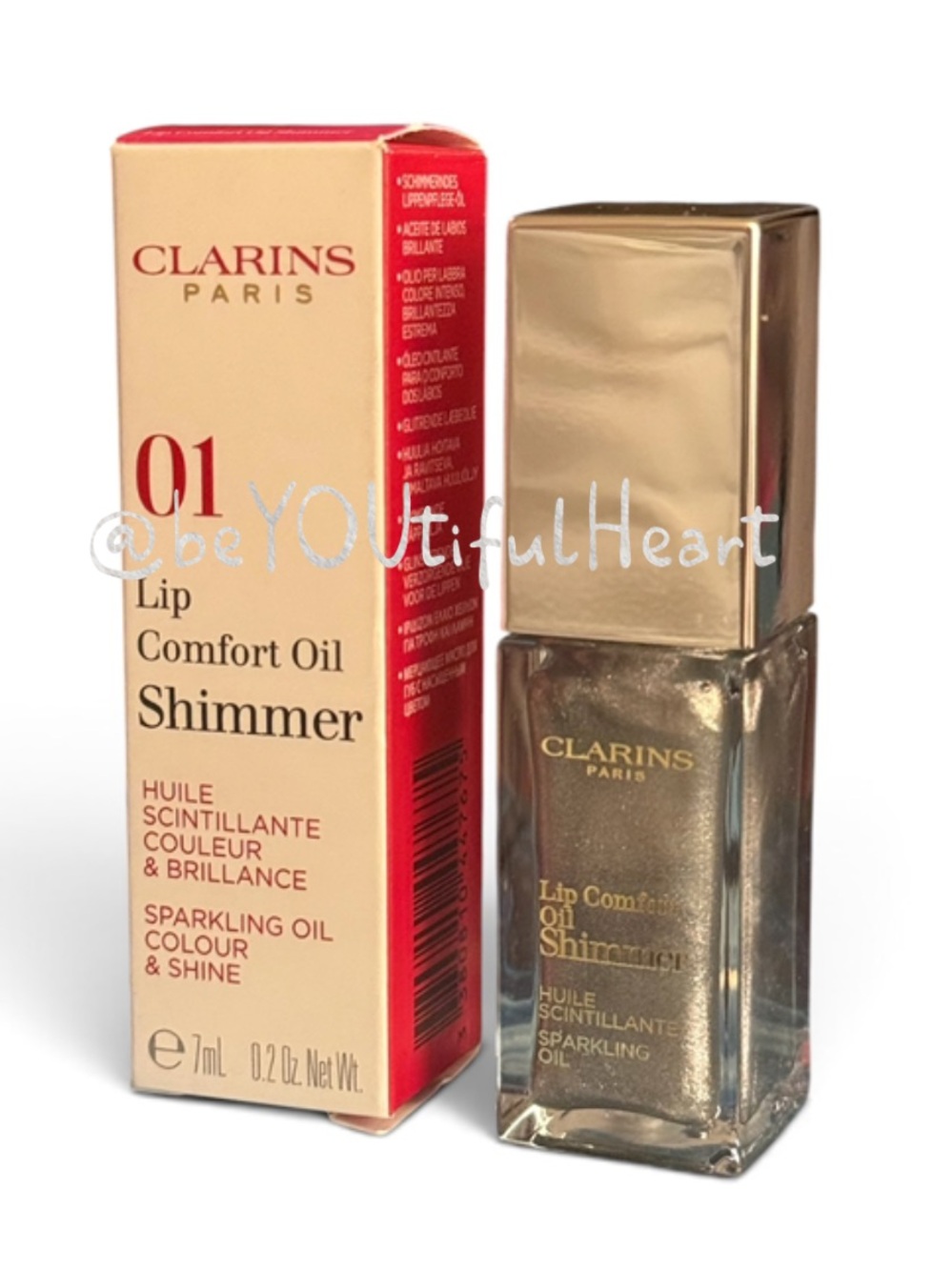 Clarins Lip Comfort Oil Shimmer in 01 Sequin Flares  0.2 fl oz / 7 ml Full Size